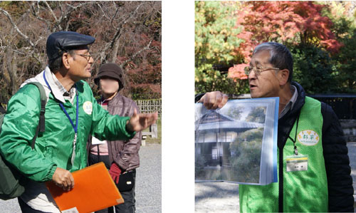 案内する田村光弘会員(左)、水本博会員