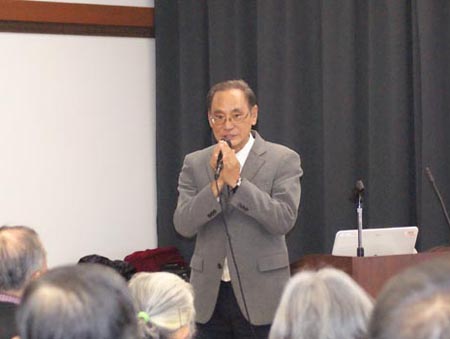 講演する田村光弘会員(12月)